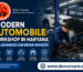 Featured image of a modern automobile workshop in Haryana with a mechanic repairing a car and the Sita Ram Hanuman logo displayed prominently.